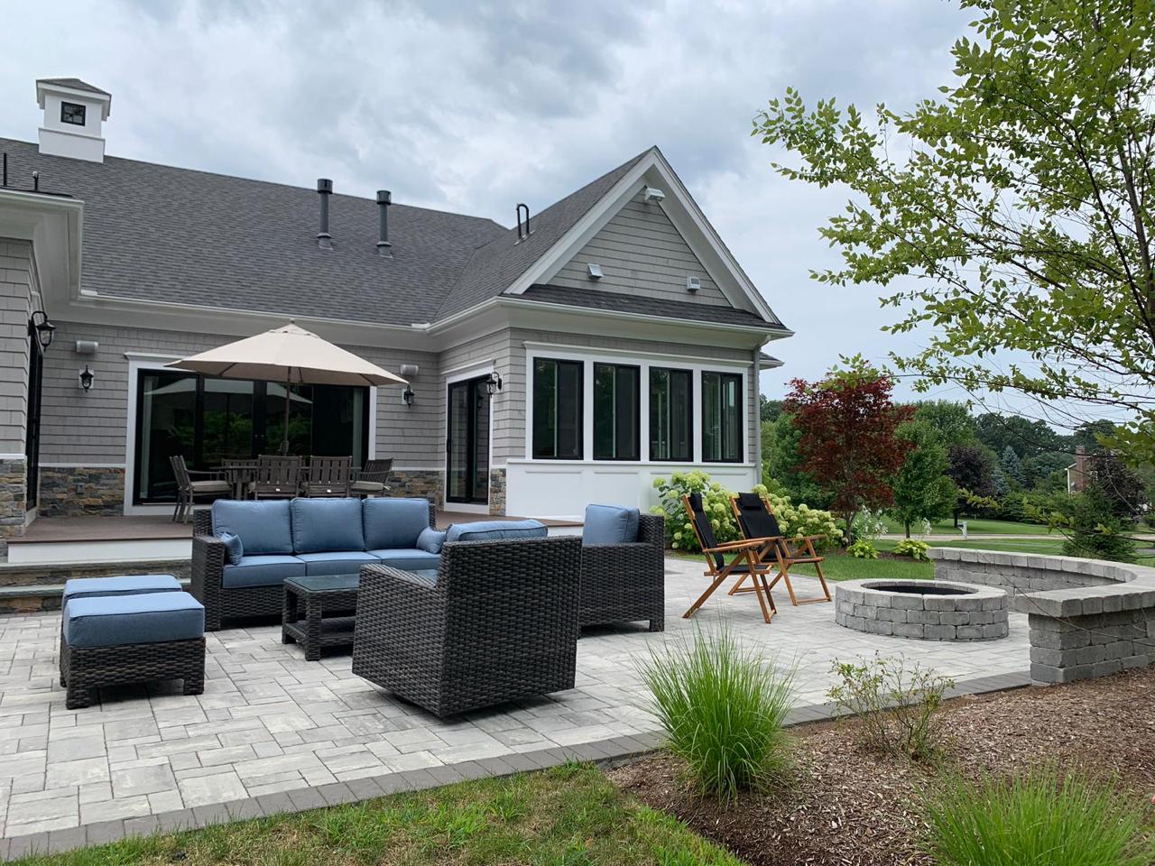 Custom Patio with Fire Pit & Veneer in Franklin, MA – Treo Pavers by Unilock Installed by Fieldstone Pros