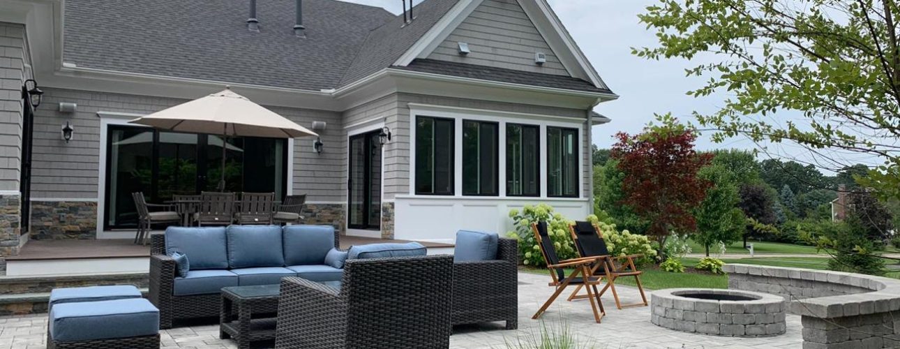 Custom Patio with Fire Pit & Veneer in Franklin, MA – Treo Pavers by Unilock Installed by Fieldstone Pros